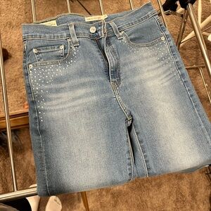 Levi’s Premium 724 high rise straight size 29 with rhinestones on front pockets